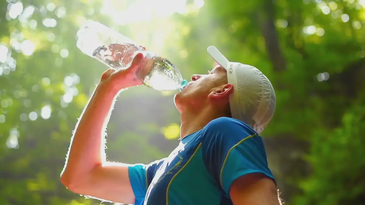 Man drinking from water bottle - Stock Image - F023/1234 - Science Photo  Library